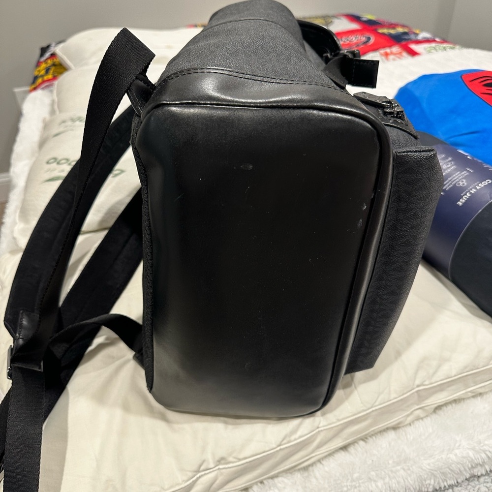 Michael Kors backpack , black like new condition beautiful inside and out..